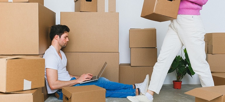 a couple in a cluttered home