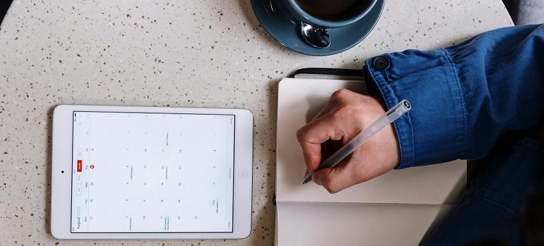 a man taking notes