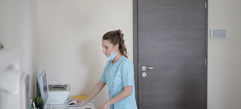 a nurse working to transfer medical records of her client