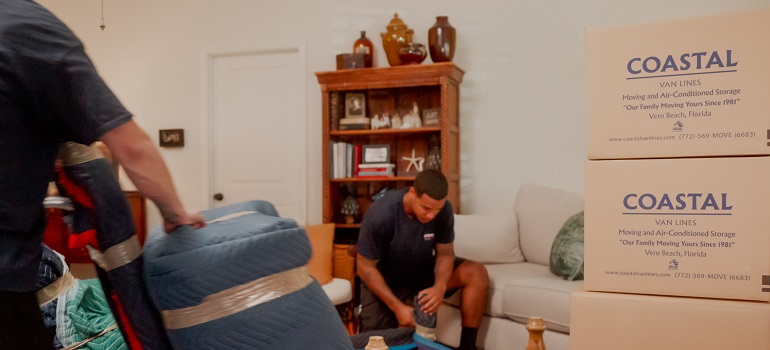 a couple of movers helping people with a senior move from Fort Pierce to Sebastian
