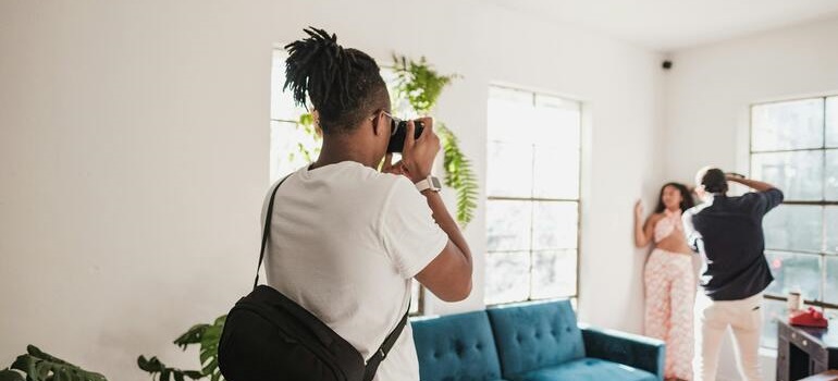 a man taking a picture of affordable housing in Palm Bay