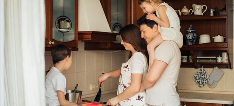 Family enjoys breakfast in a cozy kitchen.