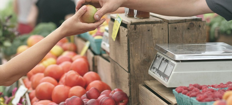 a woman practicing grocery shopping habits of Rockledge residents