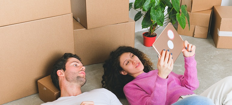 a couple unpacking after a move